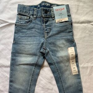 CAT AND JACK. SLIM CENIDO. SUPER STRETCH. SIZE 2T. MADE IN VIETNAM.